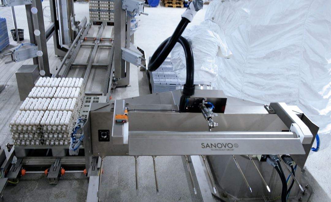 Case packing af æggebakker med Kawasaki